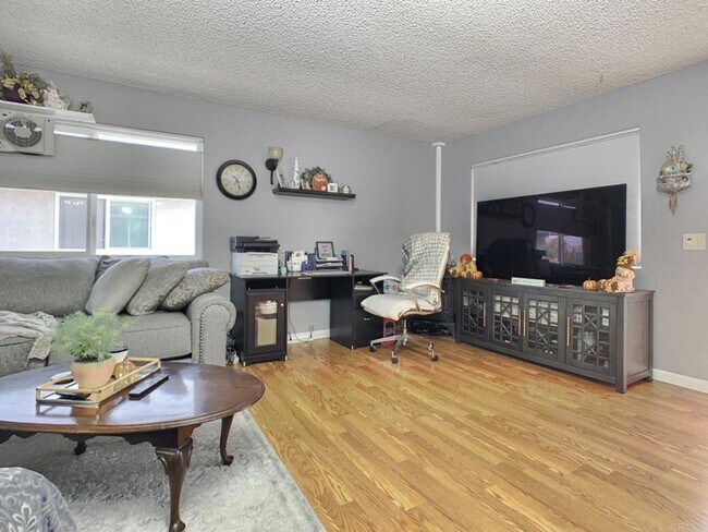 Building Photo - Adorable Upper Unit Condo with 1 Car Garage!