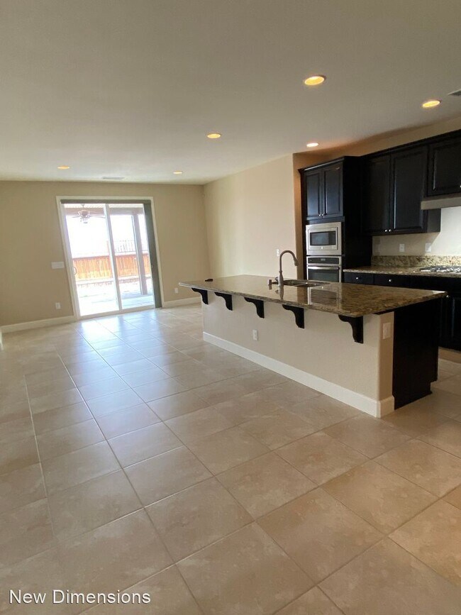 Building Photo - 4 br, 3 bath House - 10065 Barrel Racer Drive
