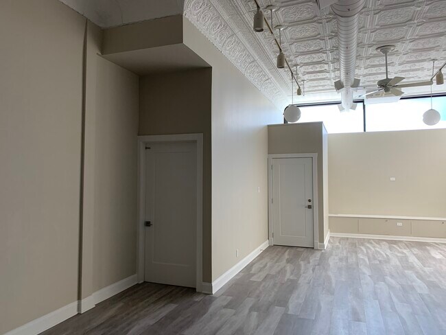 Front room entrance to basement storage - 3224 W North Ave