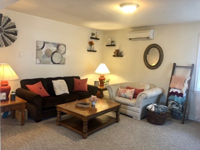 Living Room with Bay Windows - 17 E Main St