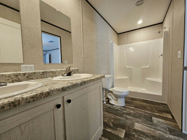 Foto del edificio - 6701 Hidden Oaks Dr