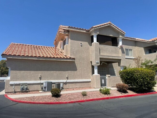 Building Photo - GATED CONDO 2 BD WITH GARAGE LOCATED NEAR SUMMERLIN!!!