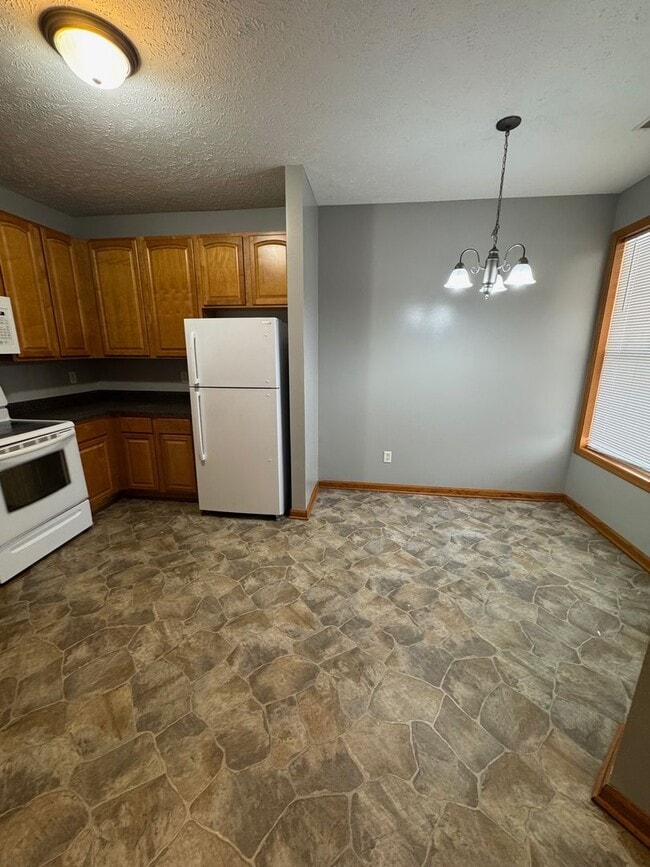 Building Photo - Two Bed, Two Bath, Two Car Garage Condo in...