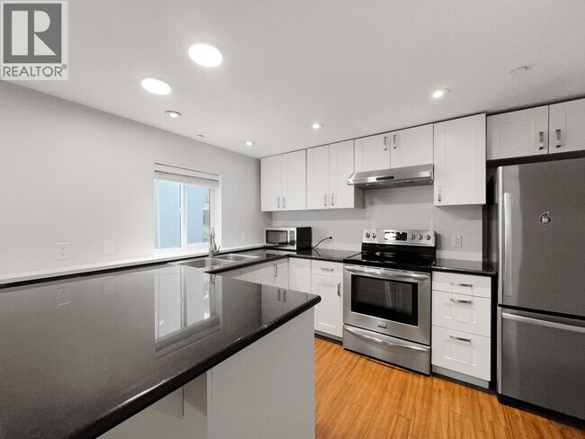 Photo du bâtiment - 3440 W 26th Ave