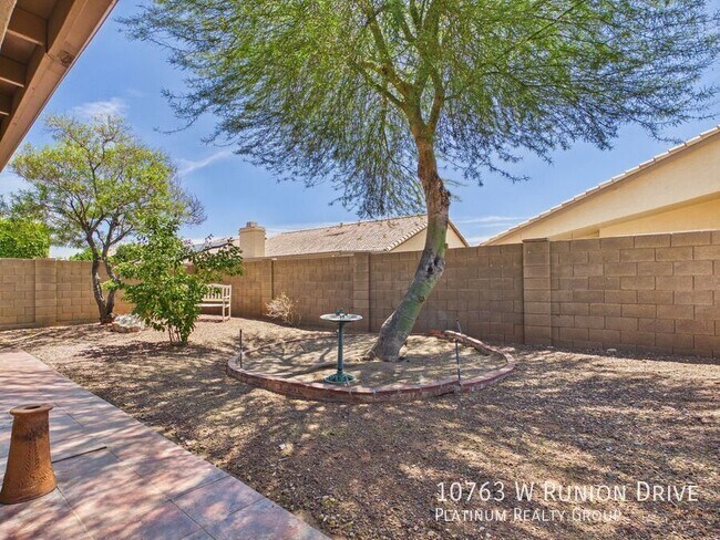 Building Photo - 10763 W Runion Dr