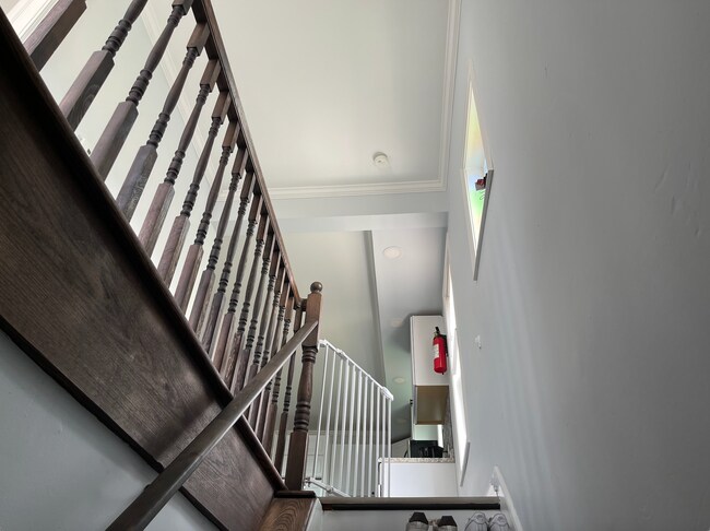 Stairs to unit leading to kitchen - 21 King St