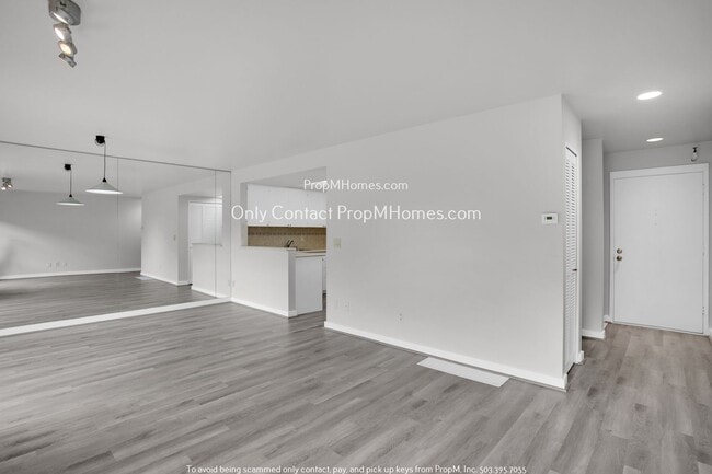 Building Photo - Charming Condo with Covered Parking and Tr...
