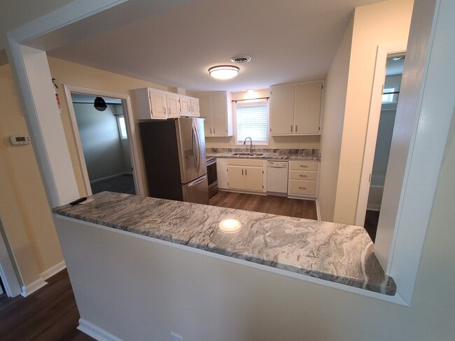 Kitchen view from front room - 105 Oakwood Dr