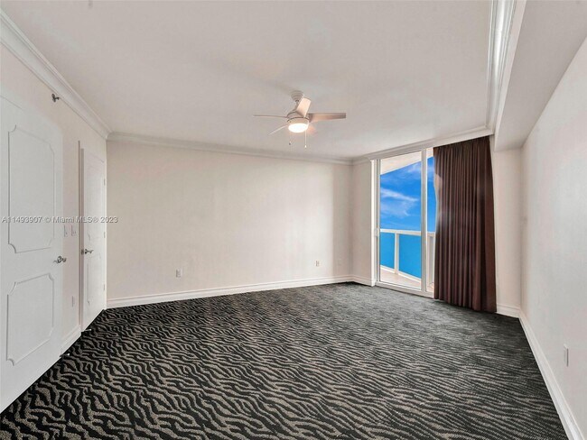 Building Photo - 18911 Collins Ave