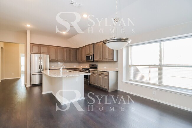 Building Photo - Modern Conveniences & Entertainment, All W...