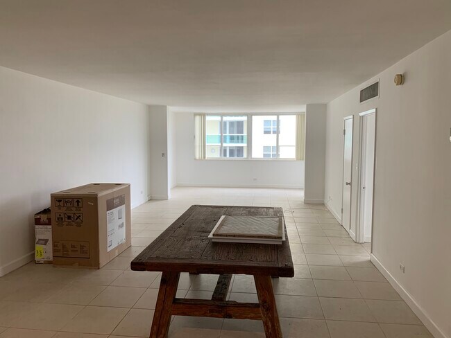 Building Photo - 5005 Collins Ave