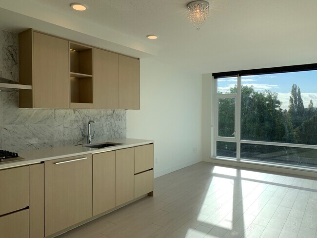 Photo du bâtiment - 721-8800 Hazelbridge Way