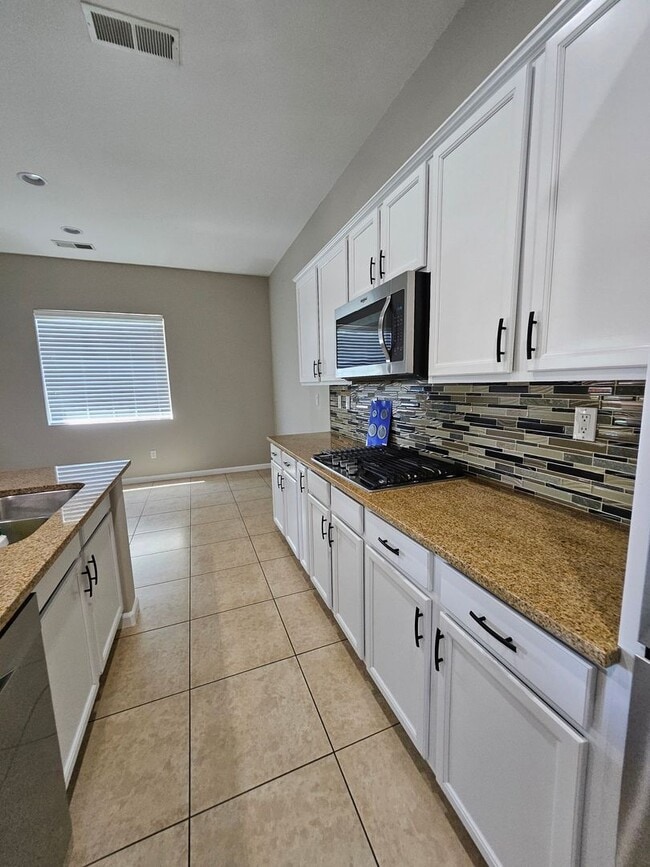 Building Photo - Gated Community with elegance and tranquil...
