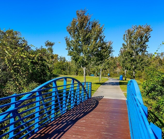 Residents enjoy walking and jogging on the Meadow Woods Walking Trail