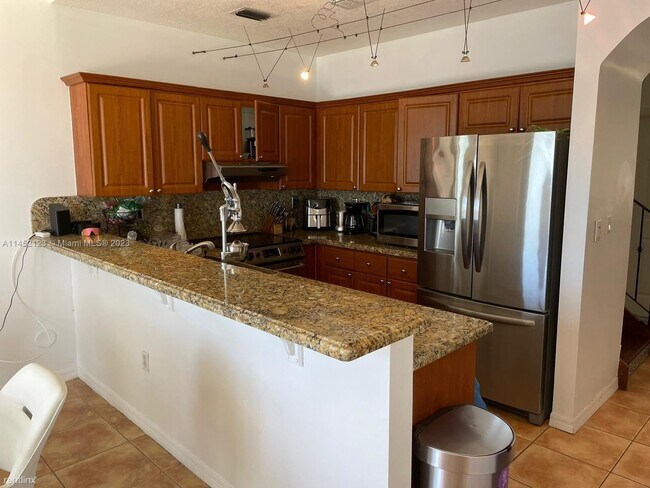 Building Photo - 3 br, 2.5 bath Townhome - 14391 NW 83rd Ave