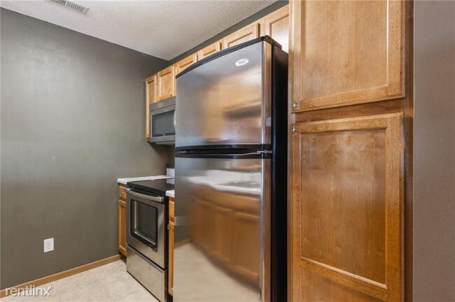 Building Photo - 2 br, 2 bath Condo - 3507 E Ave NW D Unit D