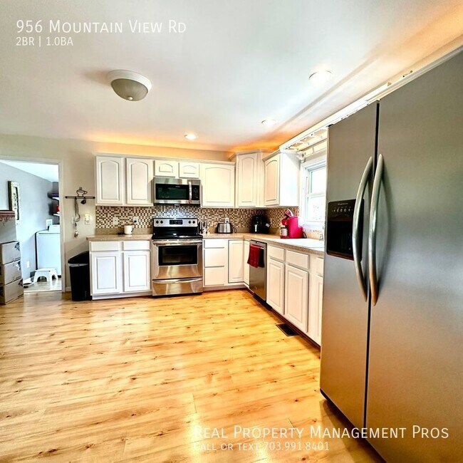 Building Photo - Renovated Bungalow on Private Lot with Mod...