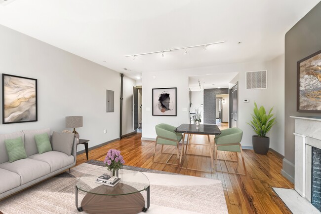 Apt 3 Living Room - Patio view - 1010 N Calvert St