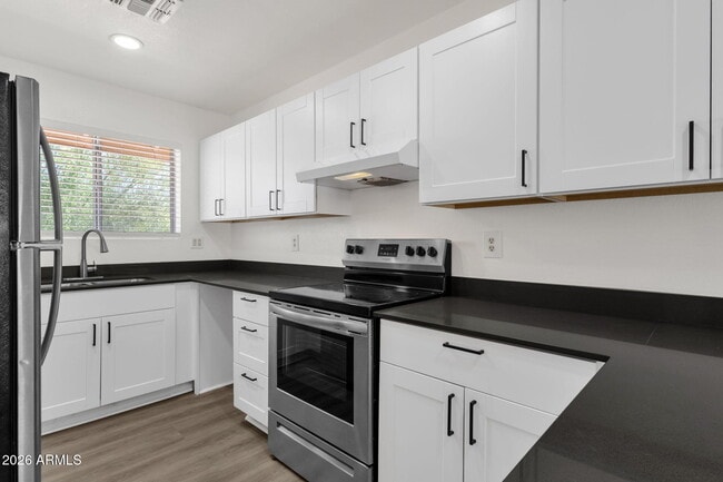 Building Photo - 6454 E University Dr