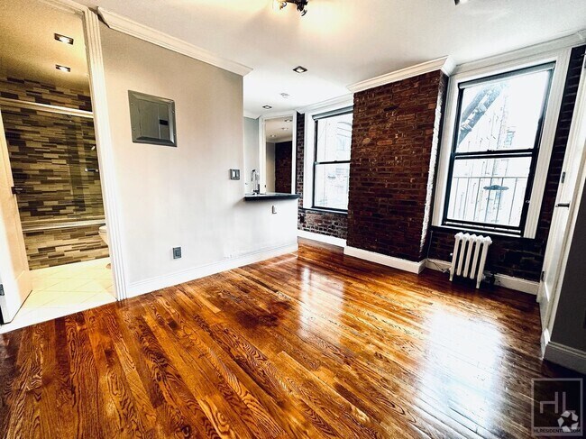 Building Photo - Sunny Nolita 1-Bedroom with Exposed Brick ...