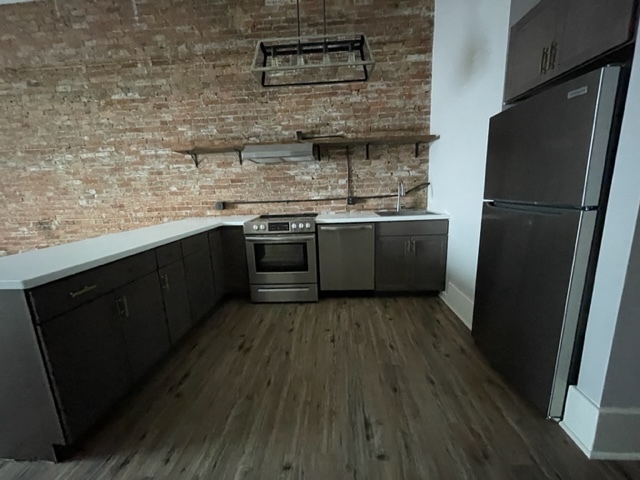 large loft style kitchen with separate eating area - 83 Main St