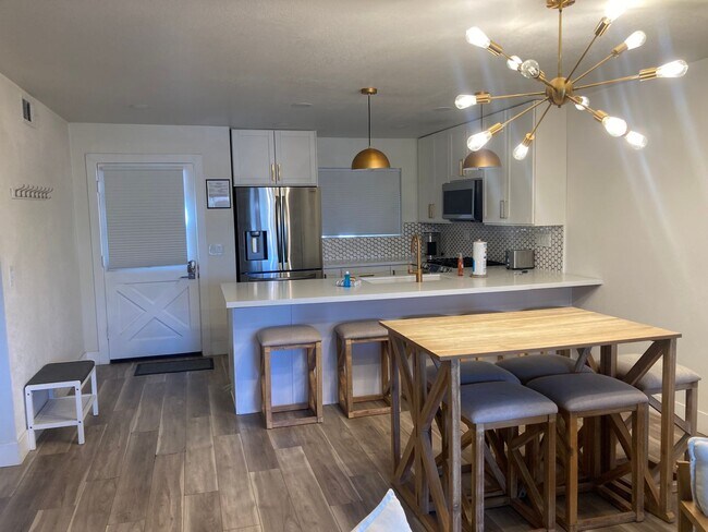 Building Photo - Stunning Lake View Condo in the Village