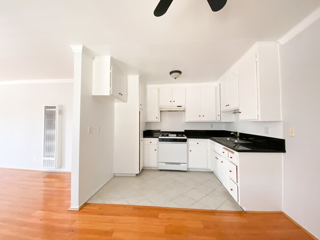 Kitchen has new countertop. - 920 N Orange Grove Ave