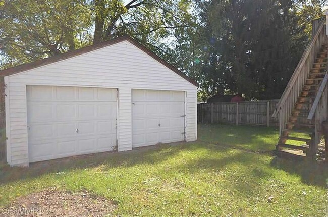 Detached garage (not for tenant use) with exterior staircase to unit. - 2221 S Burdick St