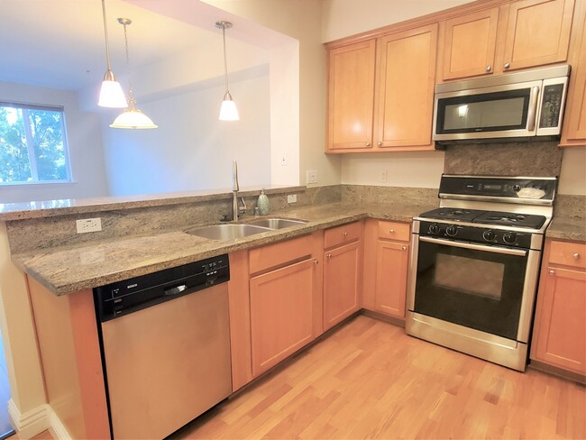 Building Photo - 1310 Creekside Drive, Unit 207