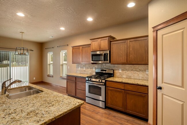 Building Photo - Great Location, Single Family Home, CDA, Pet Friendly