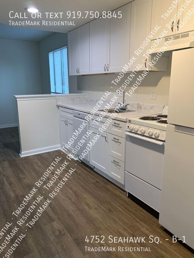 Building Photo - Renovated 1st Floor 1 Bedroom Condo Seahaw...