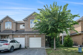 Building Photo - 108 Talltree Crescent