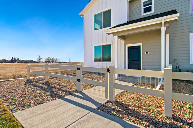 End unit next to open space - 260 Pawnee Rd