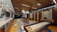 Located at 11210 Peppermint St in Louisville, KY, this single-floor amenity space delivers a dynamic blend of entertainment, relaxation, and thoughtful design. The interior opens into a generously sized game and social area defined by a striking chevron-patterned floor in muted blues, golds, and naturals. A slatted wood ceiling with integrated linear lighting lends warmth and architectural depth overhead, while exposed brick walls provide an industrial yet inviting texture throughout.

The games area is equipped with a foosball table and a shuffleboard court, alongside barrel-style seating that nods to Kentucky's bourbon heritage. Decorative woven pendant lights hang above, complementing the warm tones of the space. A large custom mural depicting Kentucky iconography—including a horse and whiskey barrel motifs—serves as a bold focal point on one wall, paired with a built-in counter and cabinetry.

At one end of the space, a living green wall creates a lush, organic backdrop for a large-format video display wall, ideal for events or entertainment. Adjacent to this, a tiered lounge area features rich hardwood stepped platforms furnished with floor cushions, ottomans, and plush blue velvet seating—offering a flexible, stadium-style gathering zone. Natural light filters in through glass-paneled doors, maintaining a bright and welcoming ambiance throughout this versatile communal space.
