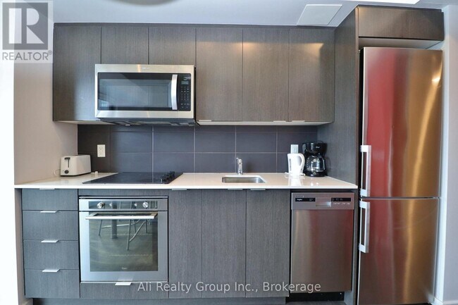 Photo du bâtiment - 105 Champagne Ave S