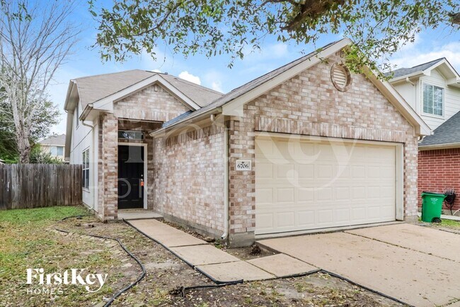 Foto del edificio - 6706 Windy River Ln