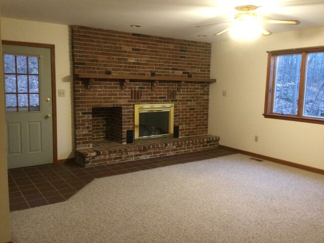 Living room/front door to deck - 1955 Upper Ridge Rd