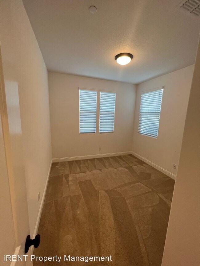 Building Photo - 4 br, 3 bath House - 1512 Peony Lane