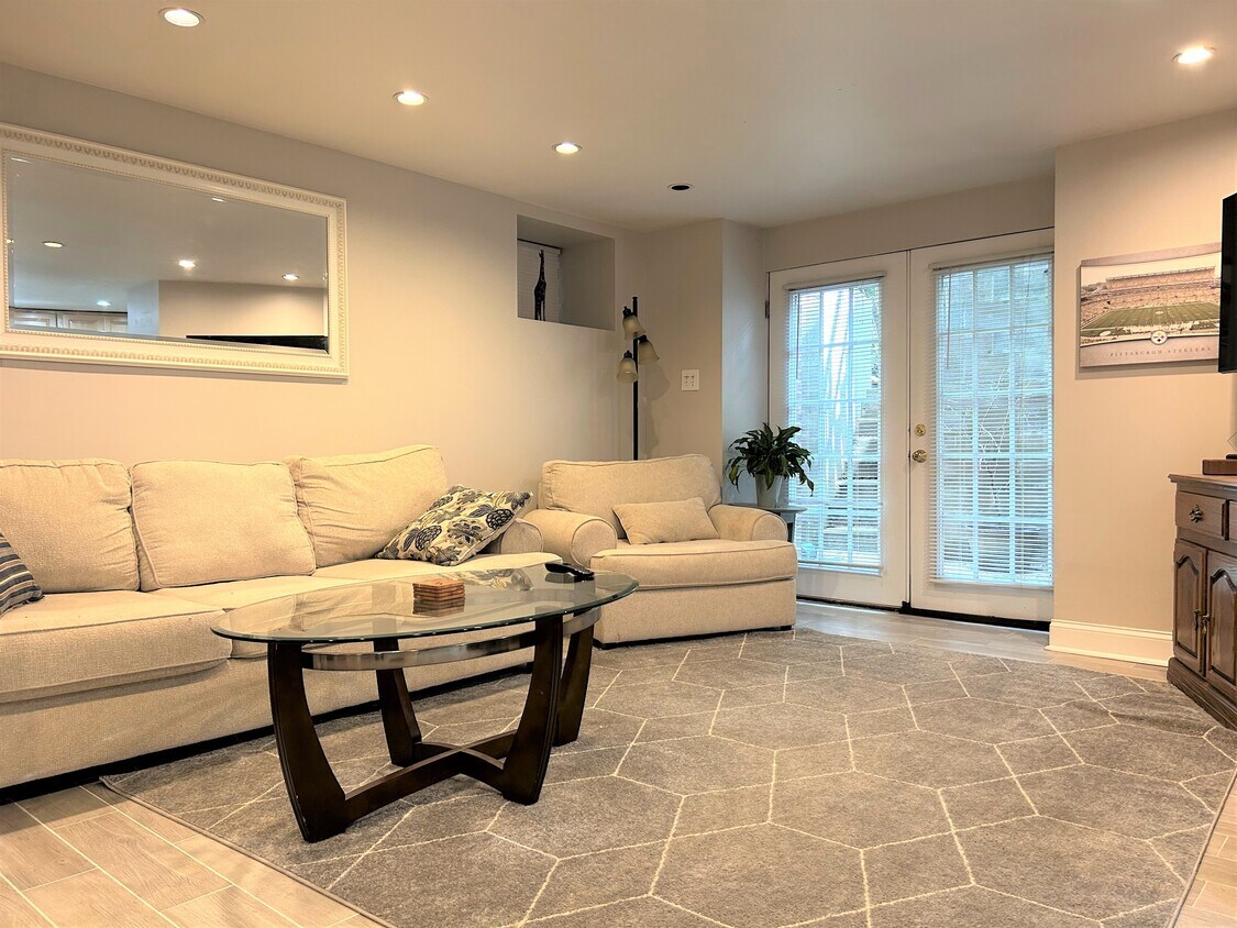 Living Room - French doors to rear patio - 707 College Ave