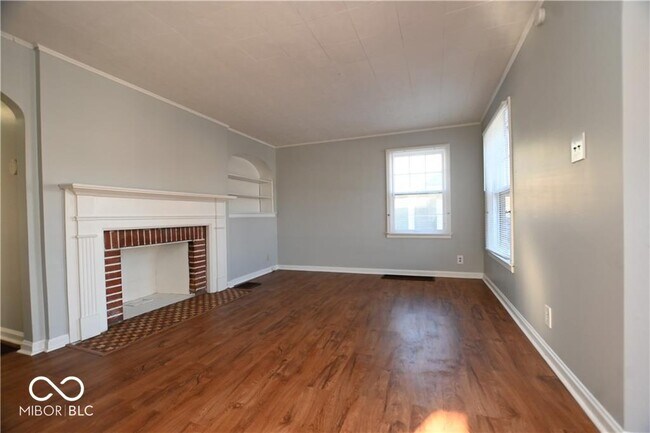 Building Photo - 5051 E 13th St