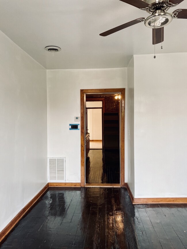 Living room facing kitchen - 1323 W 19th St