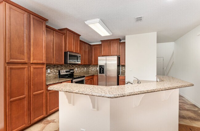 Building Photo - 9026 Paolos Pl