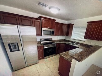 Building Photo - 5881 NW 32nd Ave