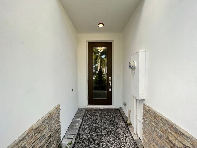 Building Photo - Upscale Modern Townhome located at Aqua Be...