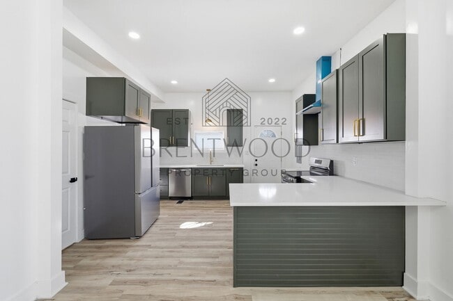 Photo - Fully Renovated 4bed, 3bath Home with Fenced In Yard