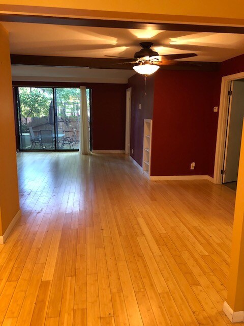 Open dining/living area with sliders - 7 Longwood Dr