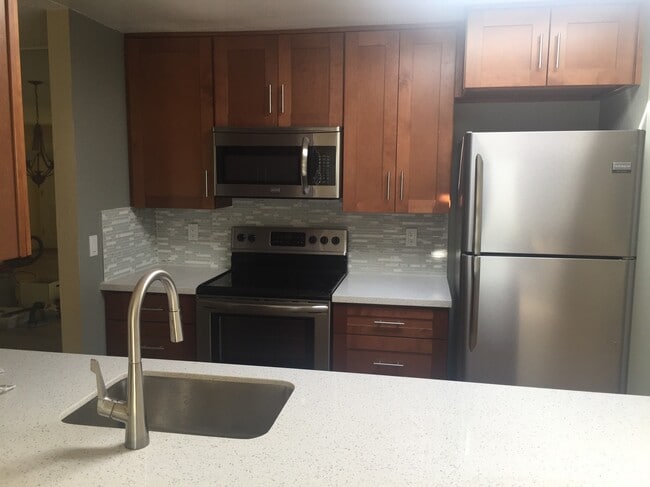 New kitchen appliances, countertops, and cabinets, - 13198 SW 17th St