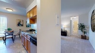 This single-floor residence offers a thoughtfully designed layout that balances functionality and comfort across its key living spaces. The kitchen is efficiently organized with warm honey-toned cabinetry, ample upper and lower storage, a stainless steel gas range and refrigerator, a double-basin sink, and tile flooring — providing everything needed for everyday meal preparation. An adjacent dining nook features the same tile flooring and is brightened by a window, creating a casual yet defined eating area. The living room is generously proportioned, finished with soft wall-to-wall carpeting, and features large sliding glass doors that invite natural light and provide access to an outdoor area. A louvered closet door adds practical storage within the living space. The bedroom is a calm retreat, also carpeted, with a large window fitted with vertical blinds that allow for natural light and outdoor views. The full bathroom includes a tiled tub-shower combination, a toilet, and a vanity with storage. Neutral wall tones and consistent finishes throughout the space contribute to a cohesive and inviting atmosphere well-suited for comfortable, everyday living.