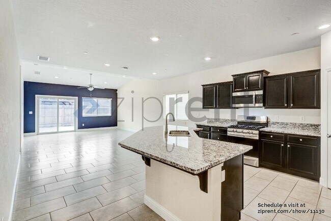 Foto del edificio - 6967 E Robinson Ave