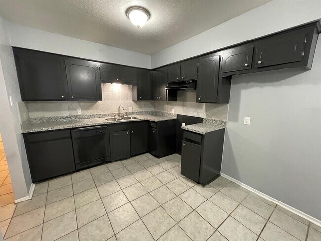 Foto del edificio - 8926 Kempwood Dr